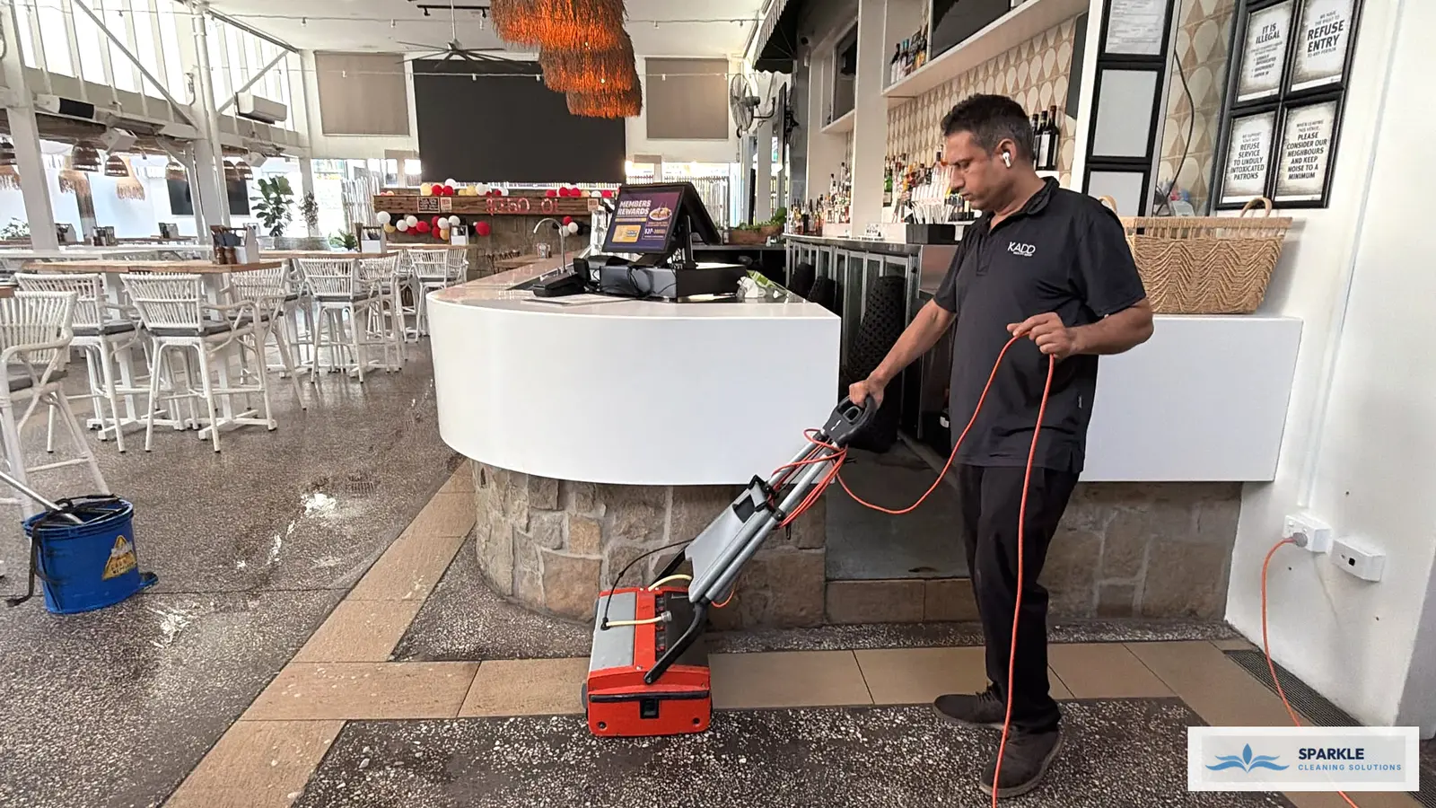 Heavy-duty industrial cleaning machinery in commercial warehouse facility