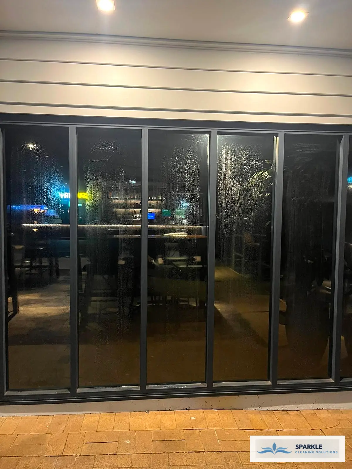 Commercial window squeegee and glass door cleaning service